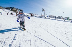 tiny snowboarder